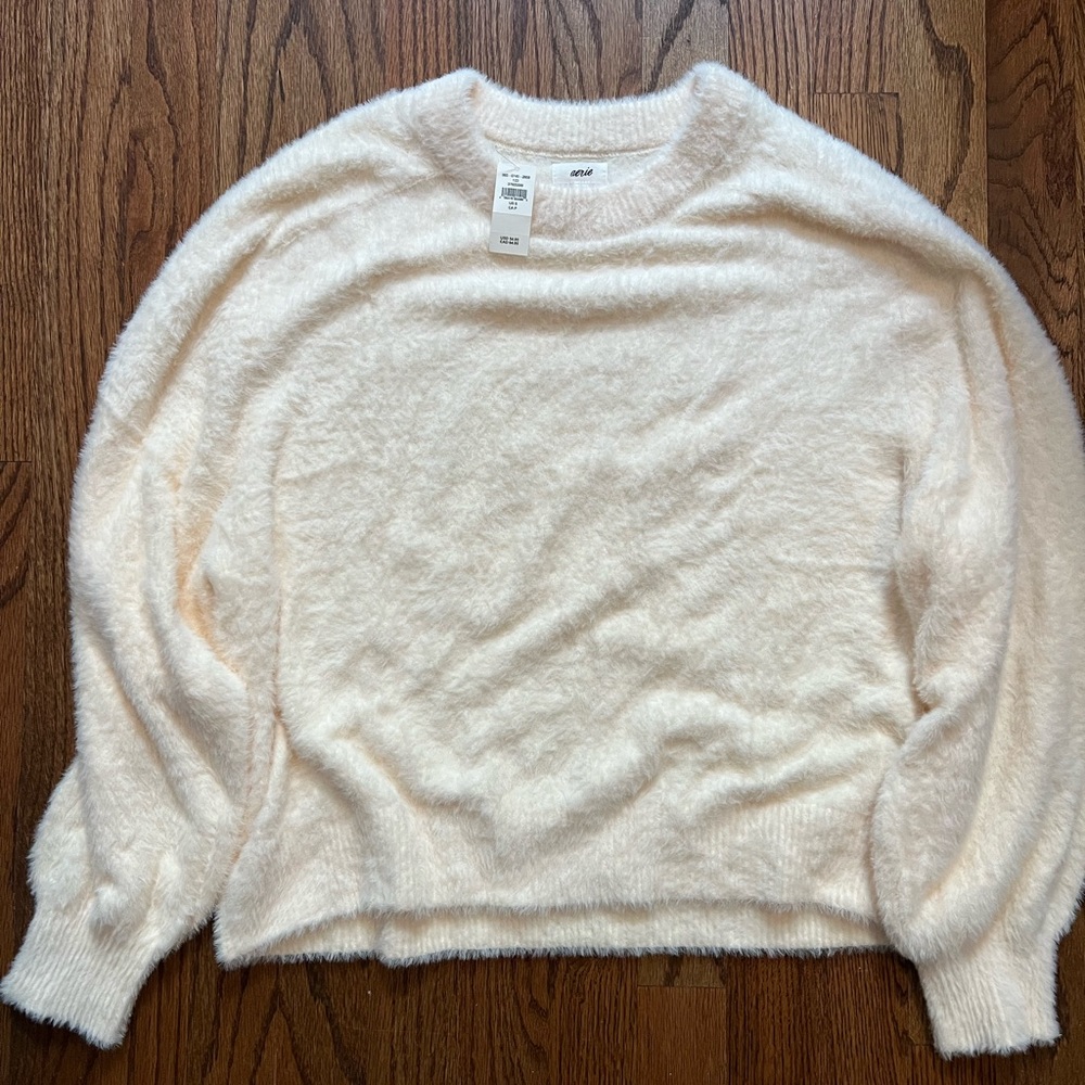 white sweater